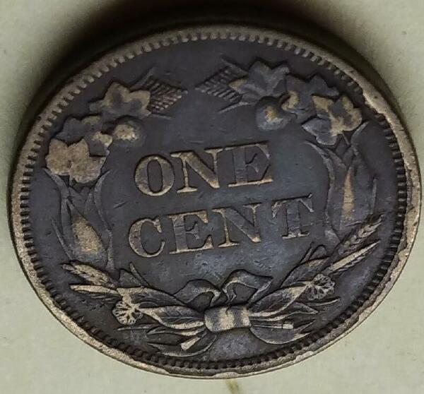 1857-Flying-Cent---Strange-Rim-Reverse